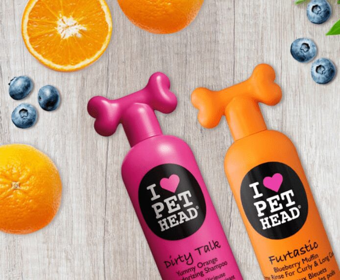 Pet Head Dirty Talk and Furtastic next to some fruits