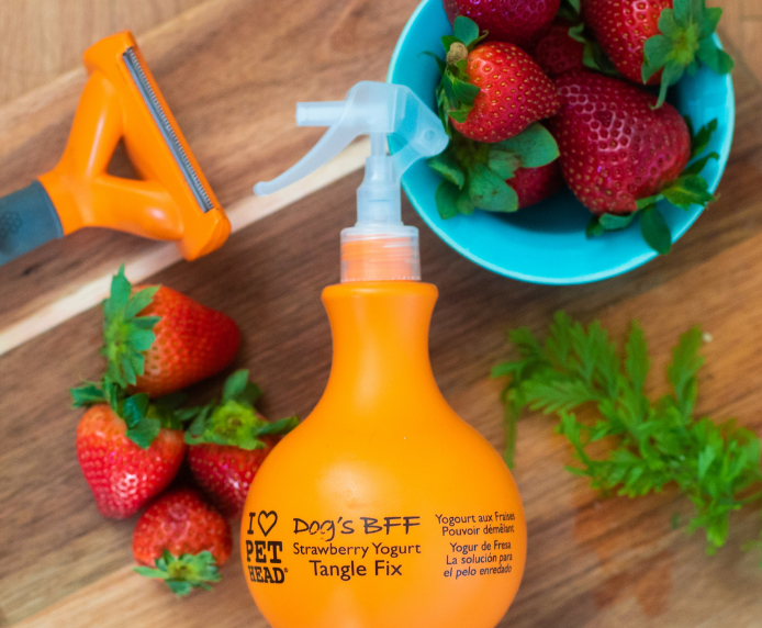 Pet Head Dog's BFF Spray next to some Strawberries