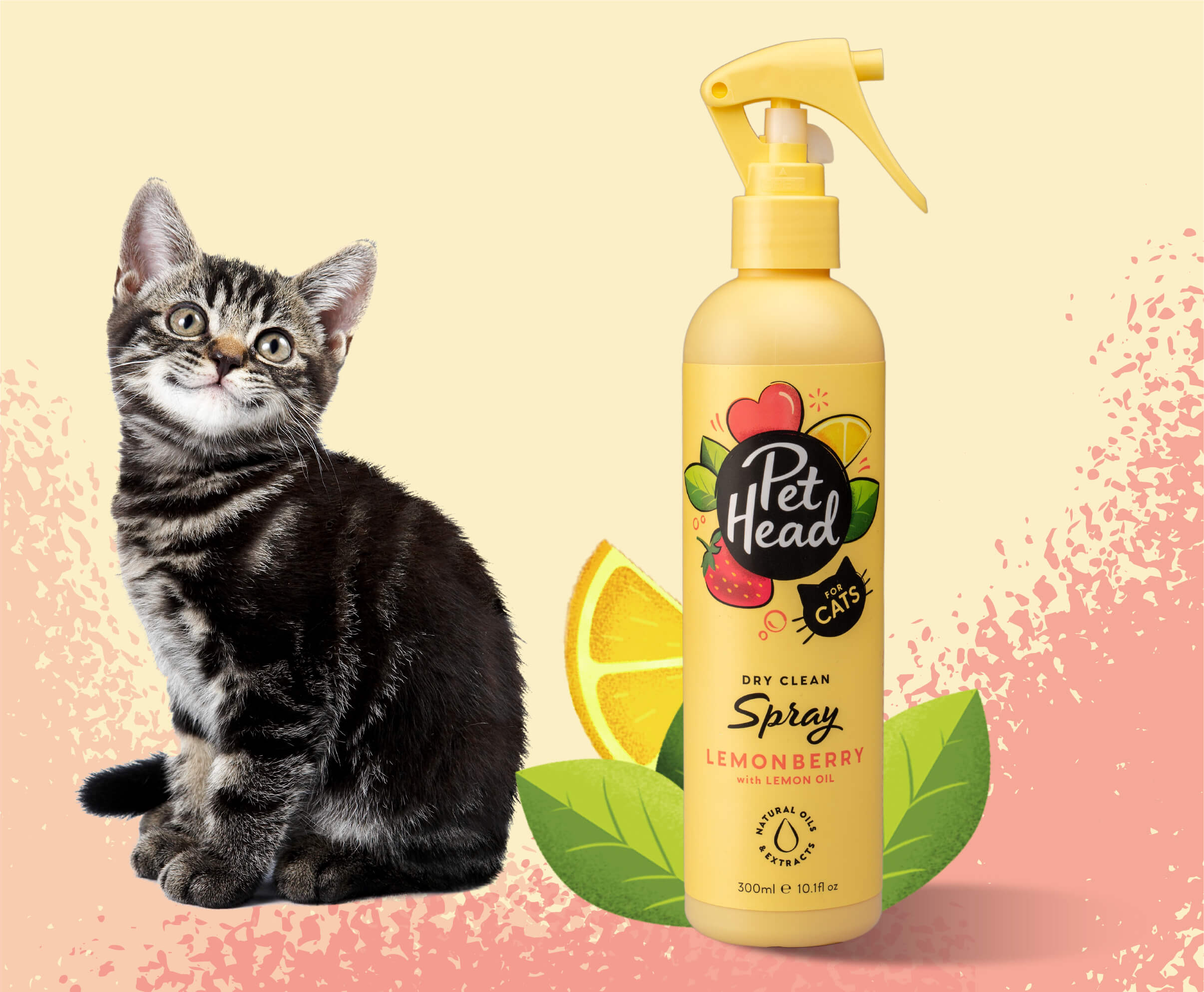 Product shot of the Pet Head Felin' Good spray next to a happy kitten