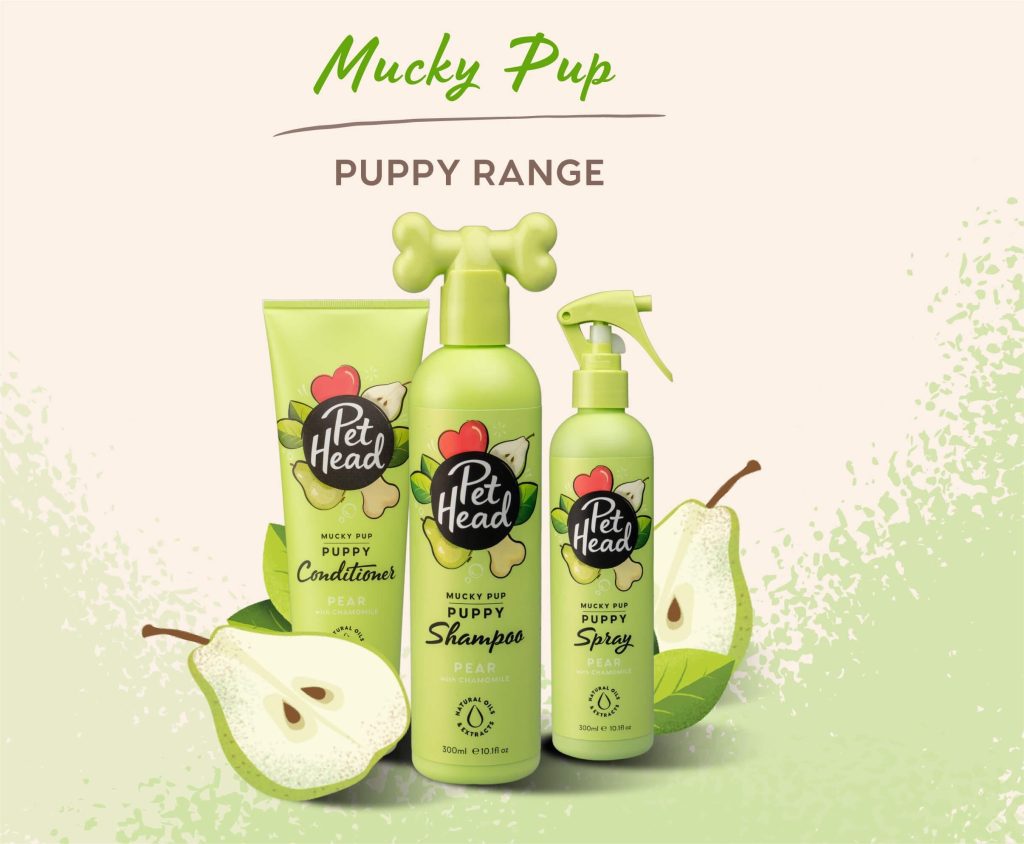 The Mucky Pup grooming kit for dogs featuring pear-scented puppy shampoo, conditioner, and spray, specifically formulated for developing puppy skin.